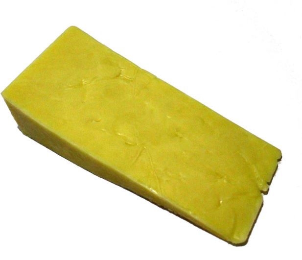 A slice of Farmhouse Mild Cheddar cheese placed against a white background.