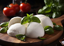 Mozzarella Cheese 168开奖官方开奖结果查询 幸运8官网开奖官方结果 直播历史记录查询 balls topped with mint leaves, arranged next to cherry tomatoes on a circular wooden plate